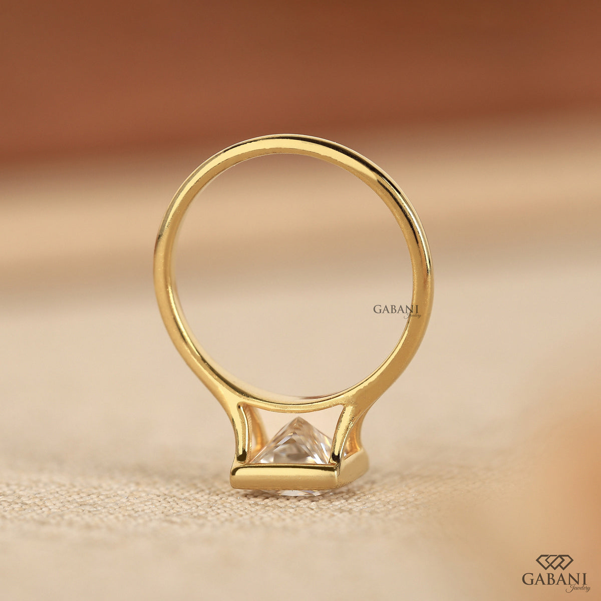 princess cut lab grown diamond ring with split shank and smooth full bezel