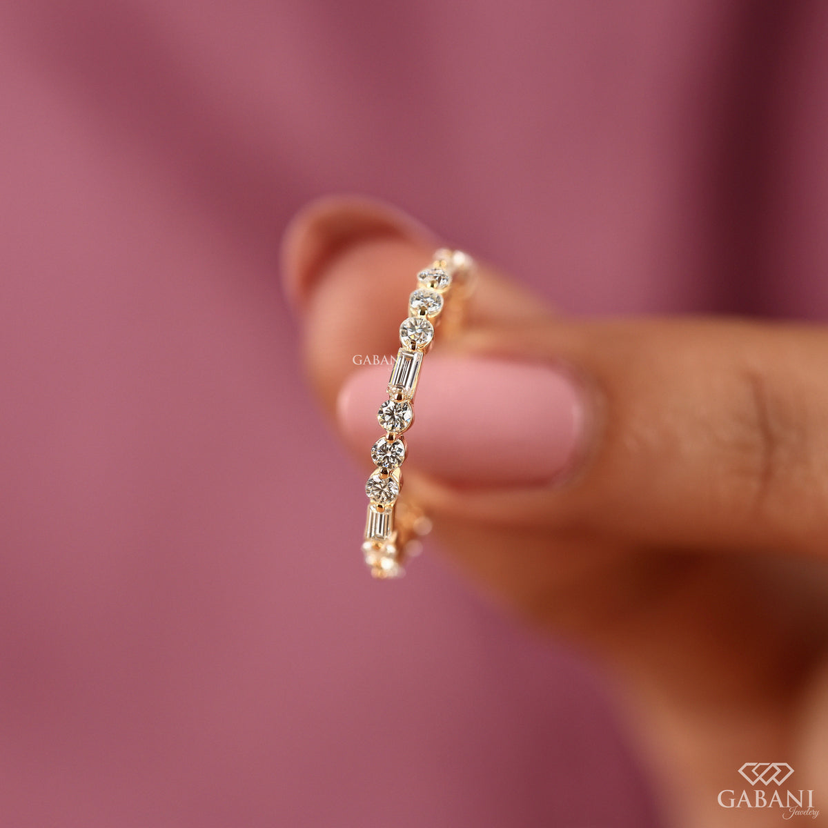 dainty 14k gold diamond band with lab grown baguette and round stones
