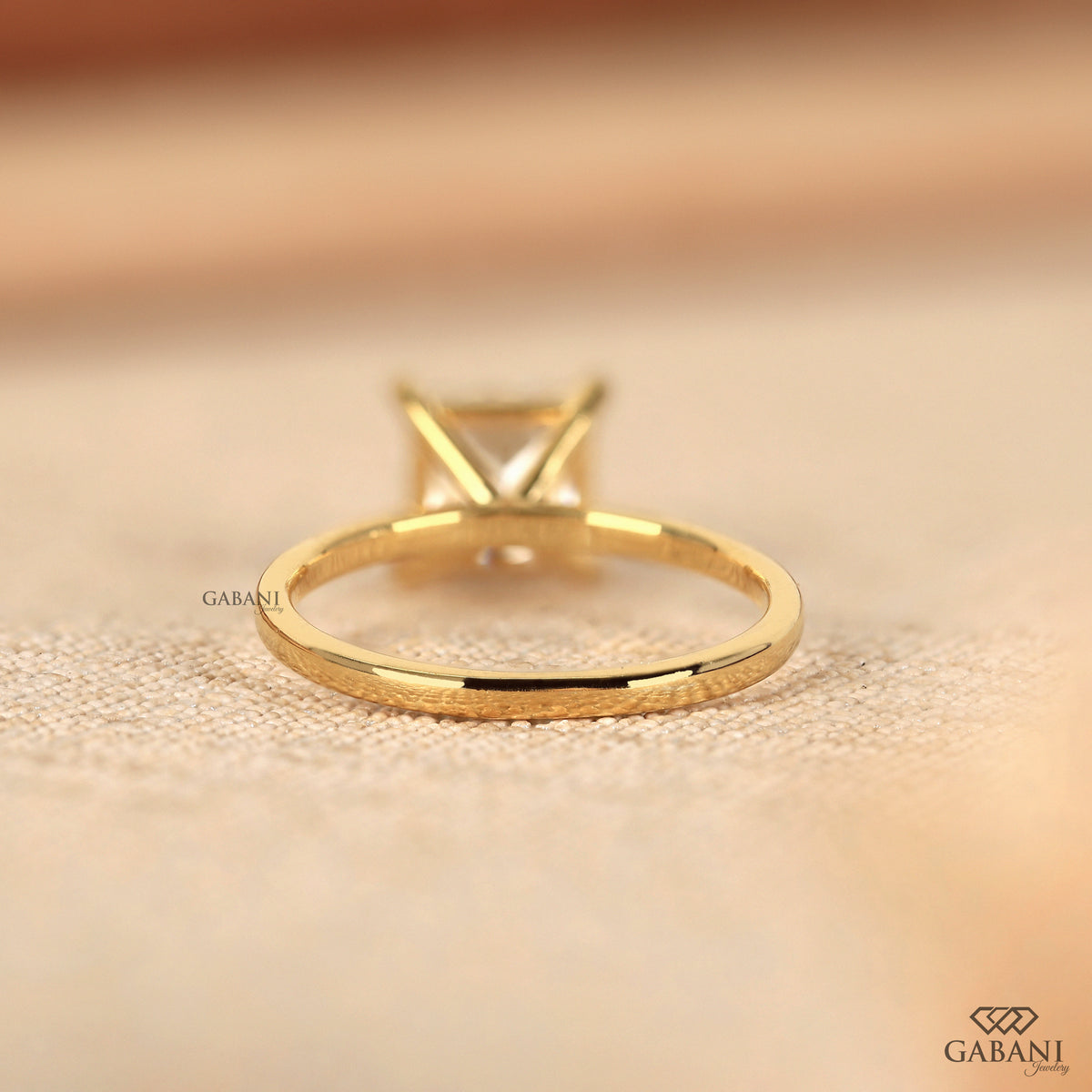 Square lab grown diamond ring in yellow gold with classic prong setting