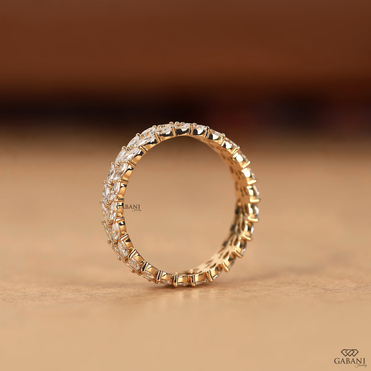marquise lab grown diamond wide band with double row eternity setting in gold