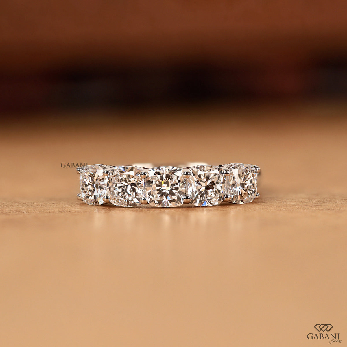 Cushion cut lab grown diamond five stone ring in white gold U prong setting