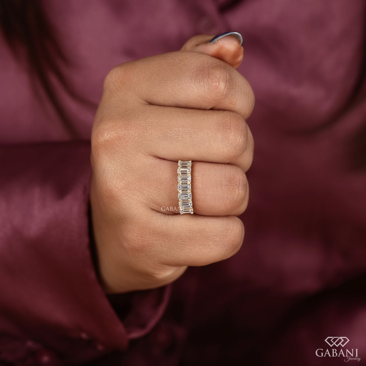 Emerald cut lab grown diamond wedding band with chunky yellow gold design