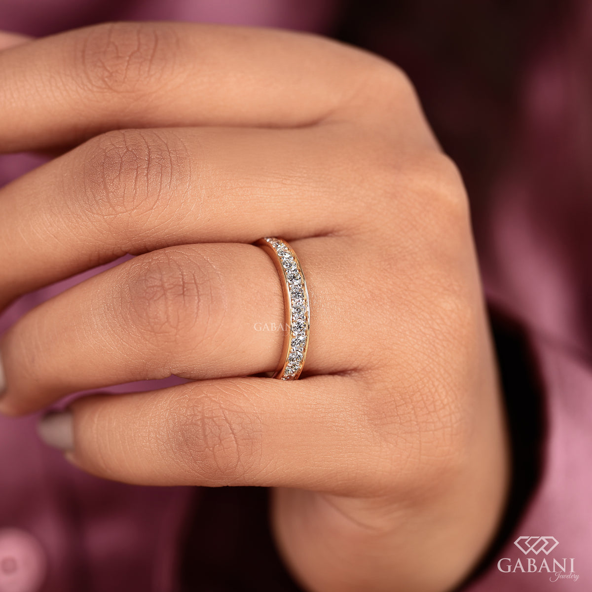 slim yellow gold eternity ring with pavé set round diamonds