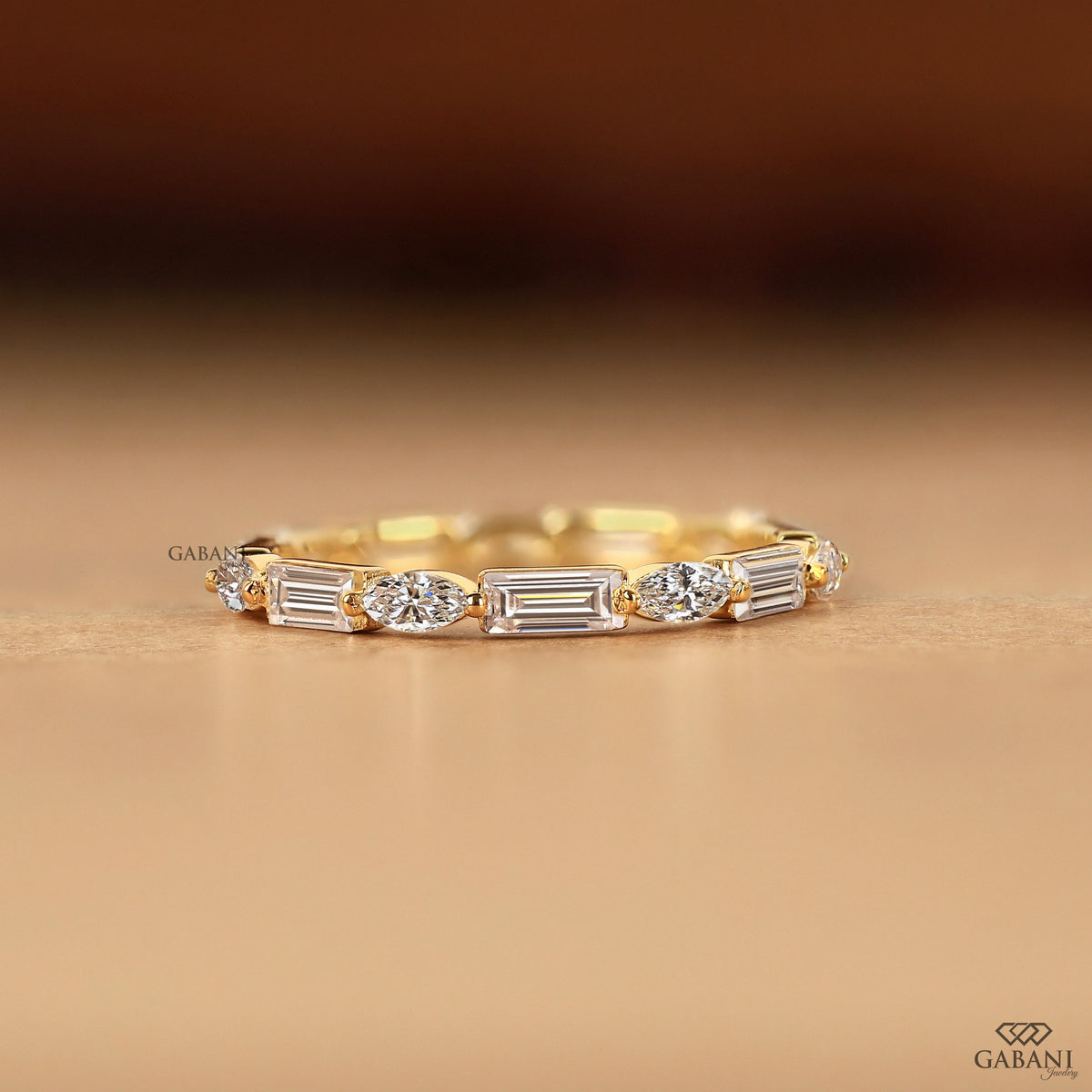 solid gold wedding band with marquise and baguette lab diamonds