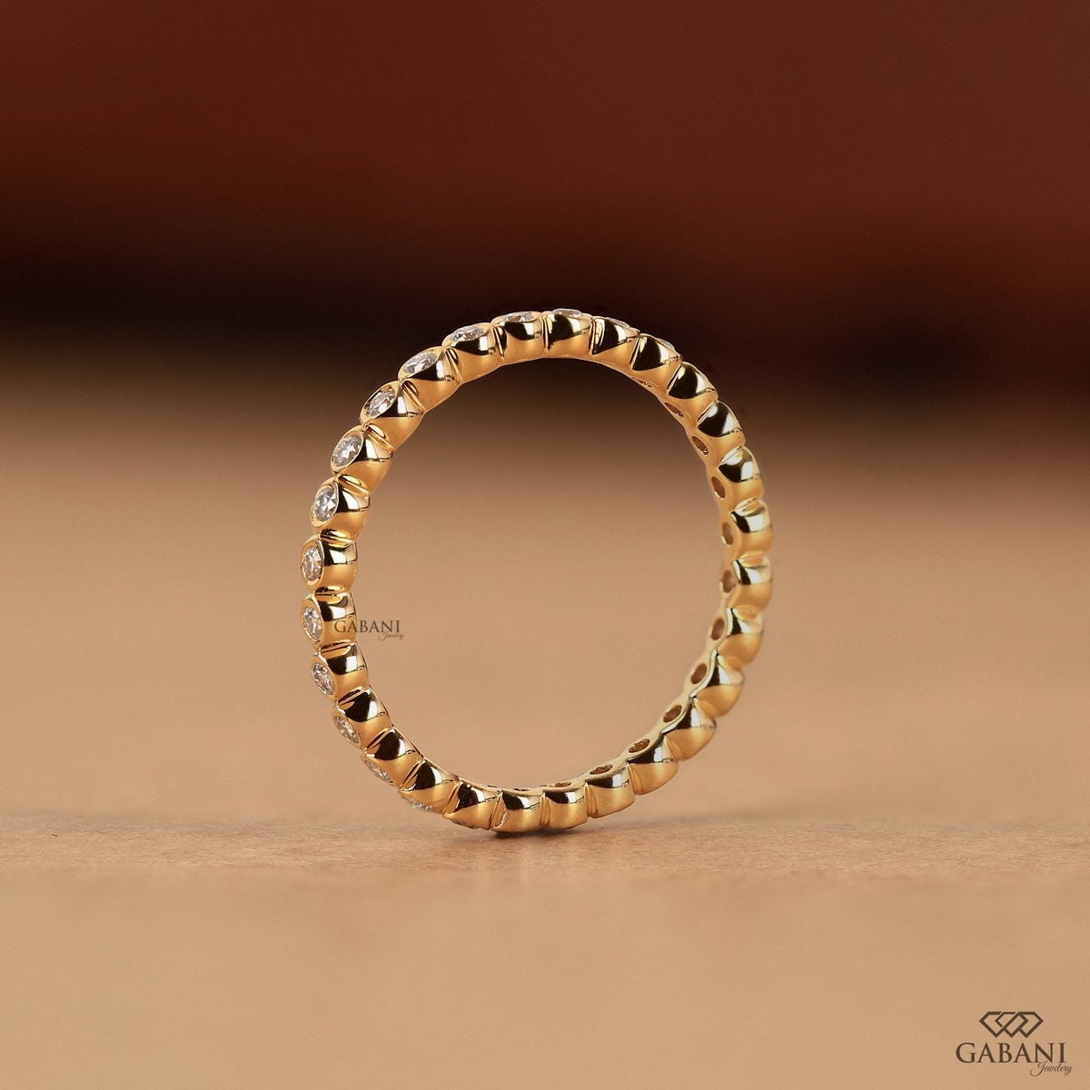 simple bezel set lab grown diamond band in gold, dainty thin stacking ring for her