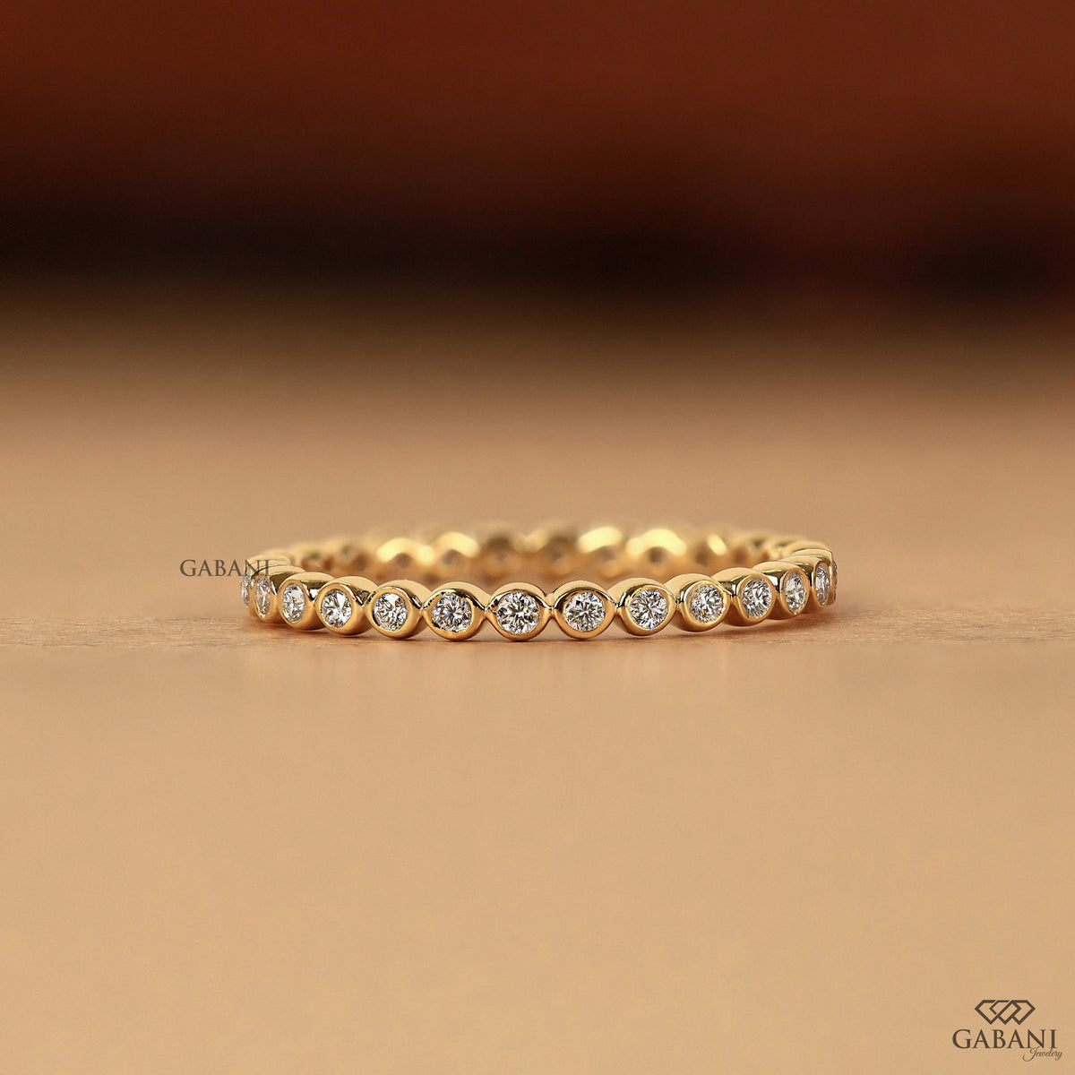 gabani jewelry bezel set lab grown diamond band in gold, dainty thin wedding ring for stacking