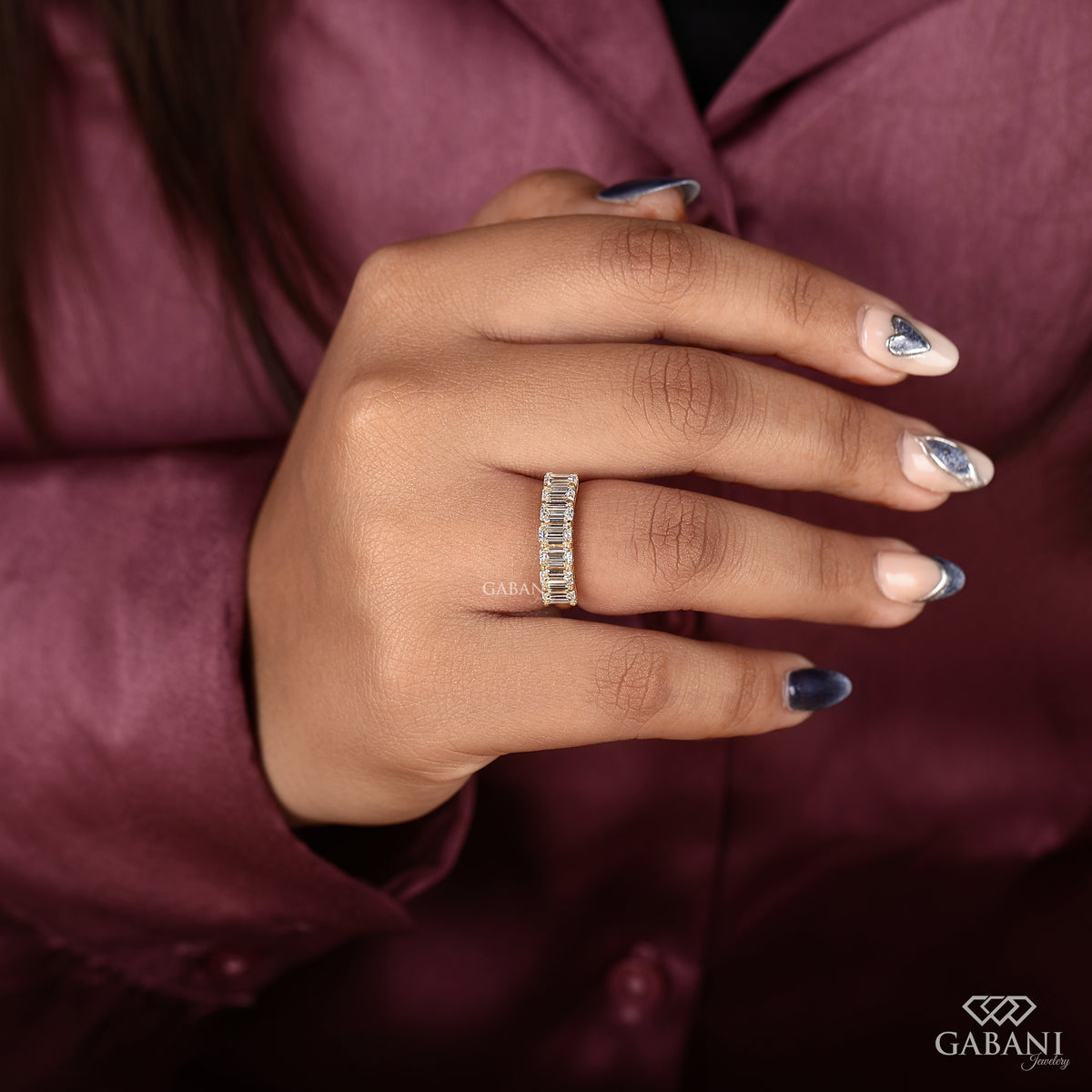 Seven emerald cut lab created diamond band in yellow gold
