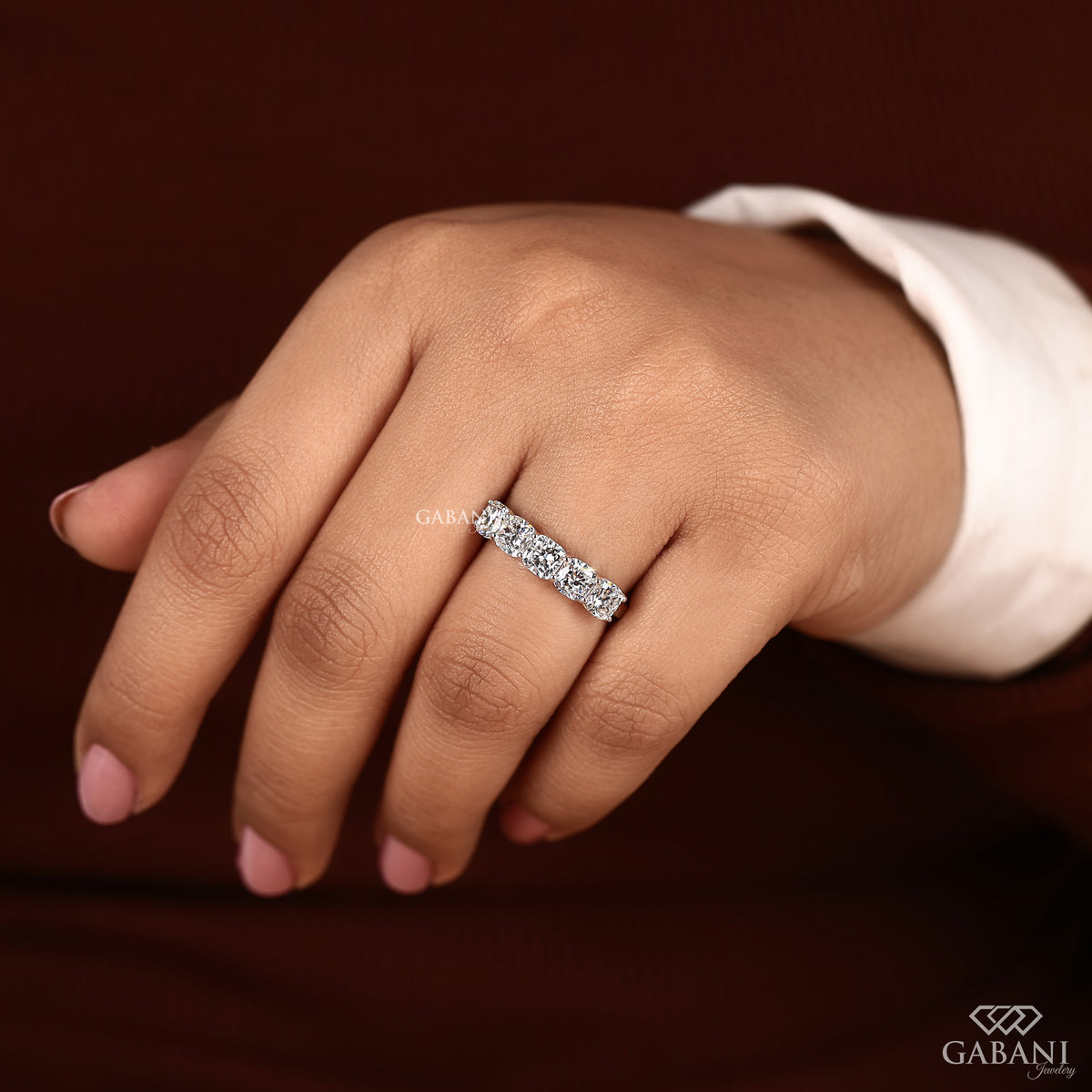 Cushion cut lab diamond five stone band with U prong setting in white gold