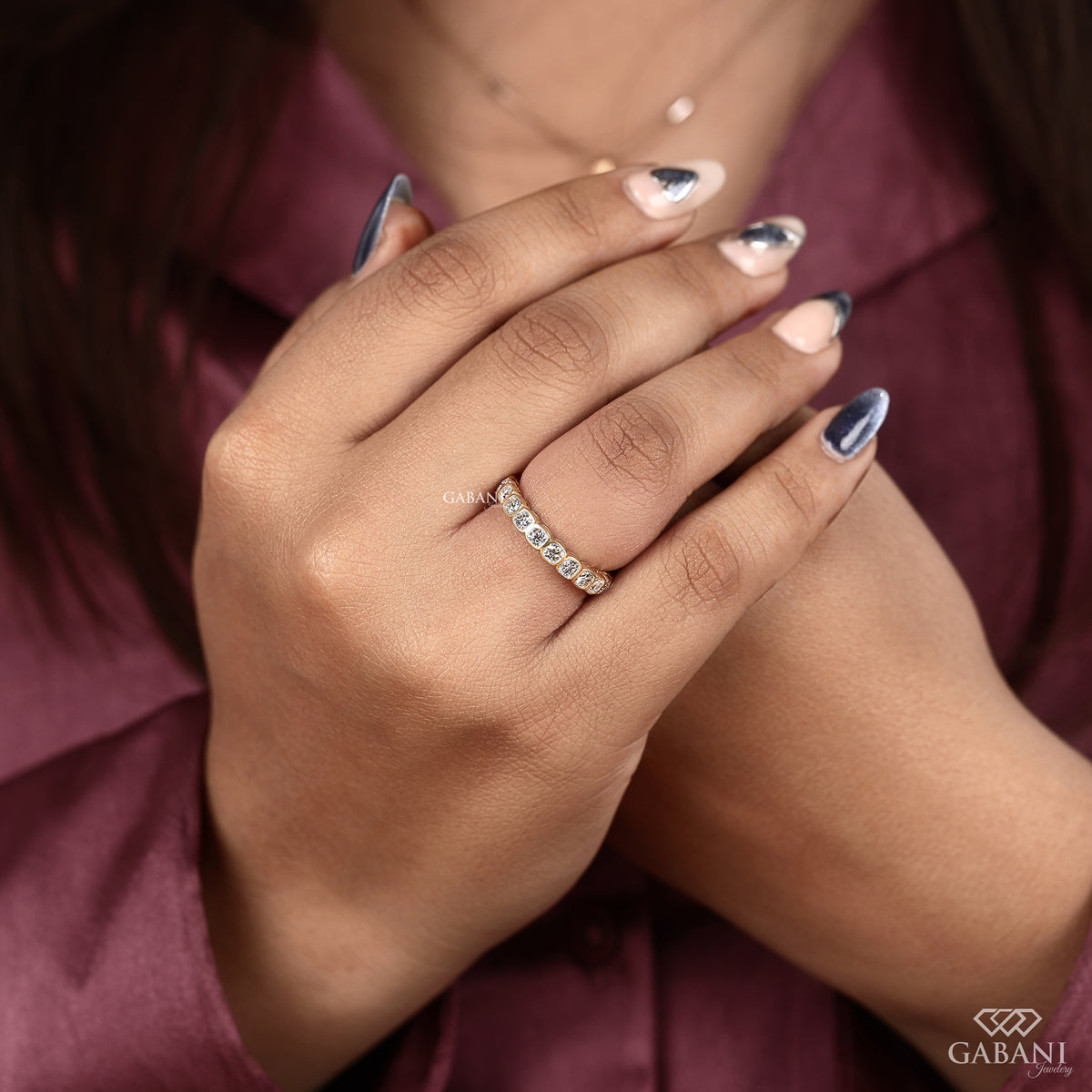 Full eternity band with bezel set cushion cut lab grown diamonds and modern thick band design