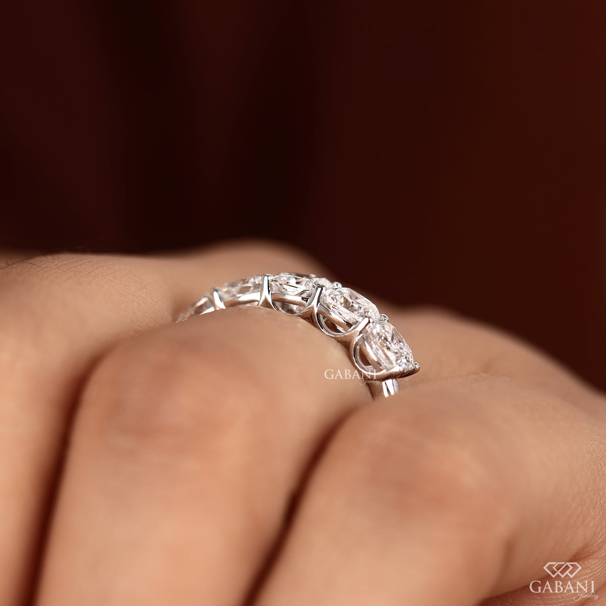 White gold five diamond ring with cushion cut lab grown diamonds