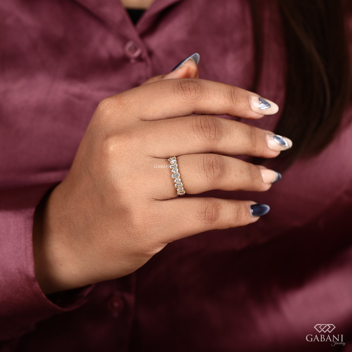 half eternity diamond band featuring emerald and pear cut lab created diamonds