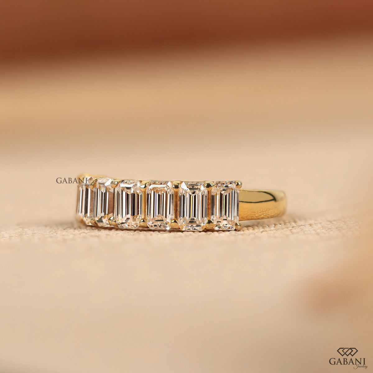 Lab grown emerald cut diamond wedding band in solid yellow gold