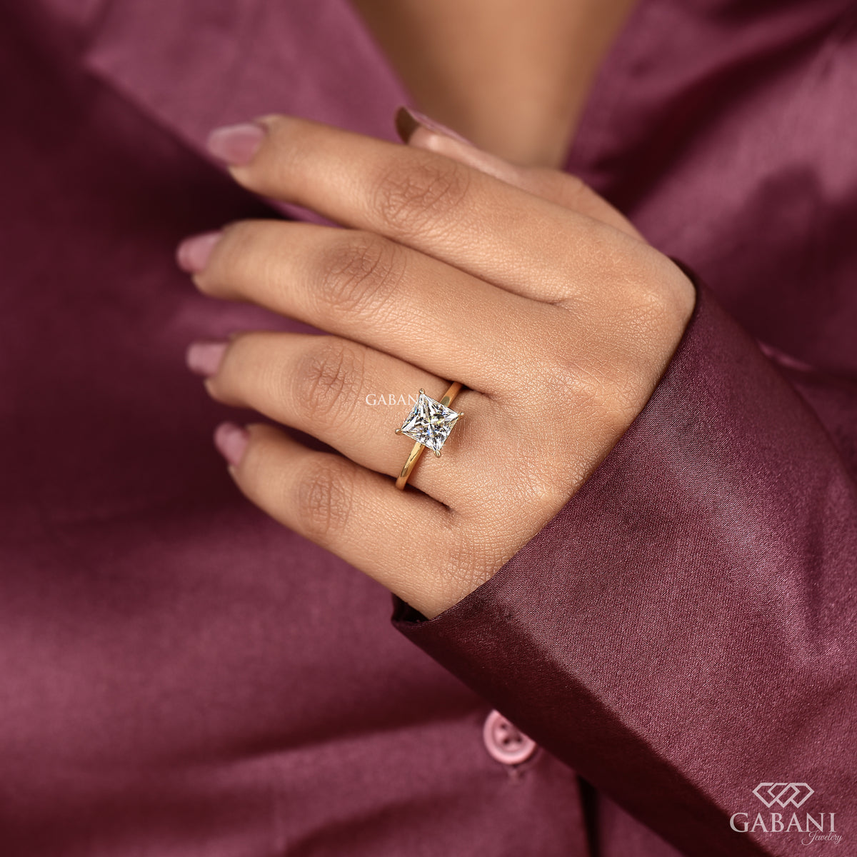 Yellow gold princess cut lab grown diamond ring with clean solitaire design