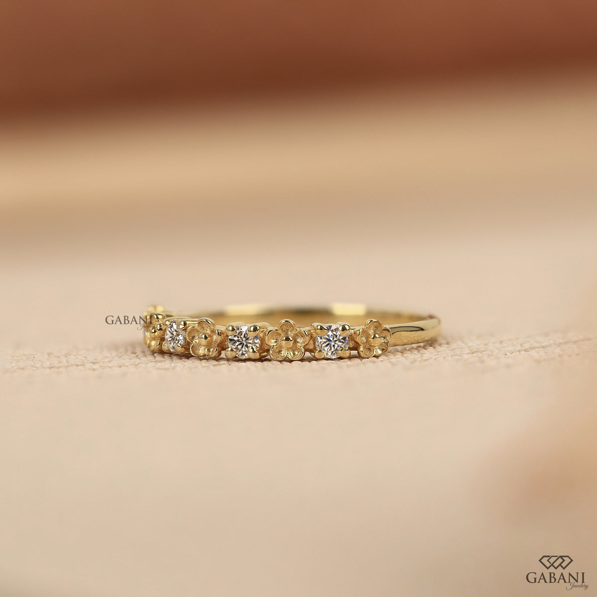 lab grown diamond band featuring a nature inspired floral design and refined slim structure