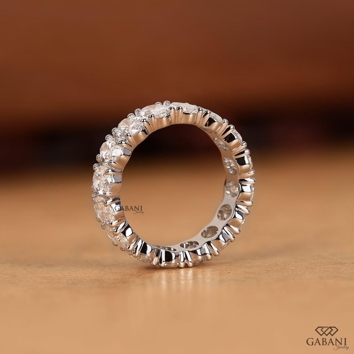 white gold oval cut lab grown diamond wide eternity wedding band