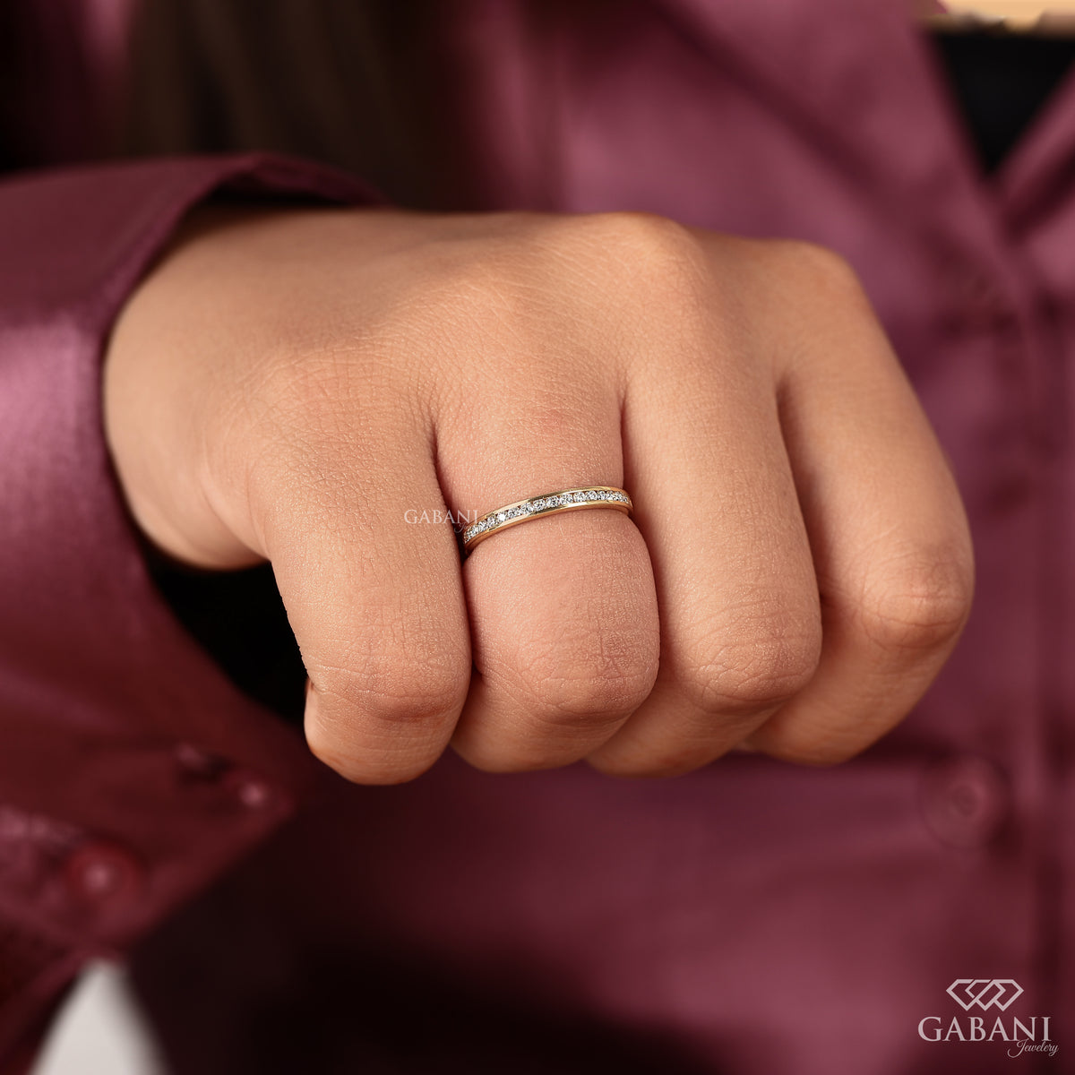 minimal yellow gold matching band with channel set lab grown diamonds