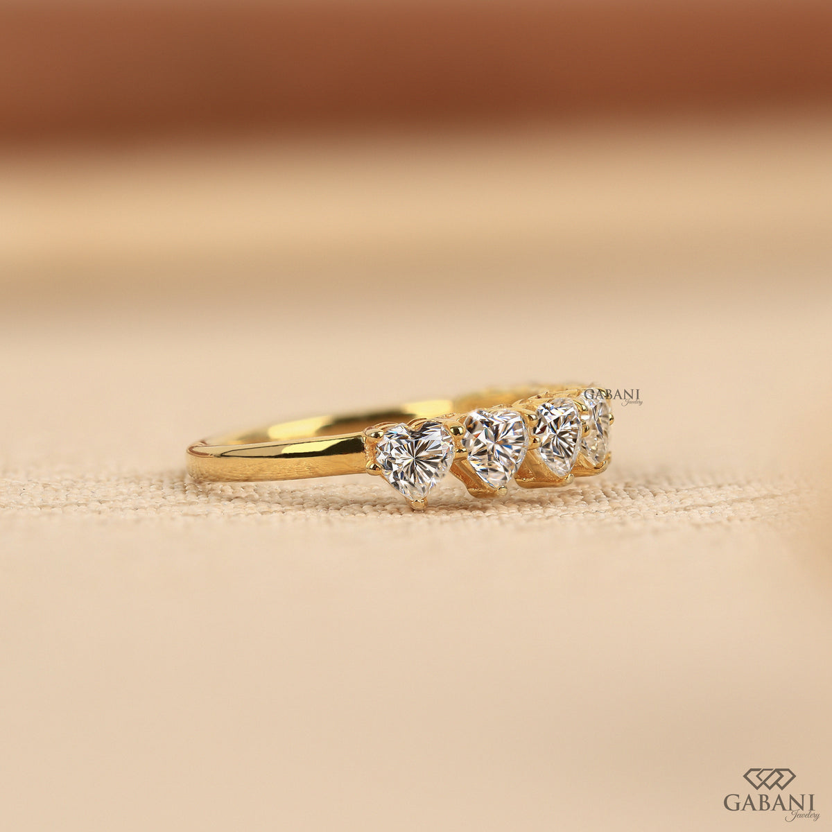 curved heart shaped lab diamond band in solid yellow gold