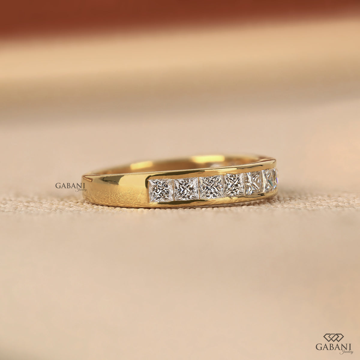 Comfort fit half eternity wedding band with princess cut lab grown diamonds
