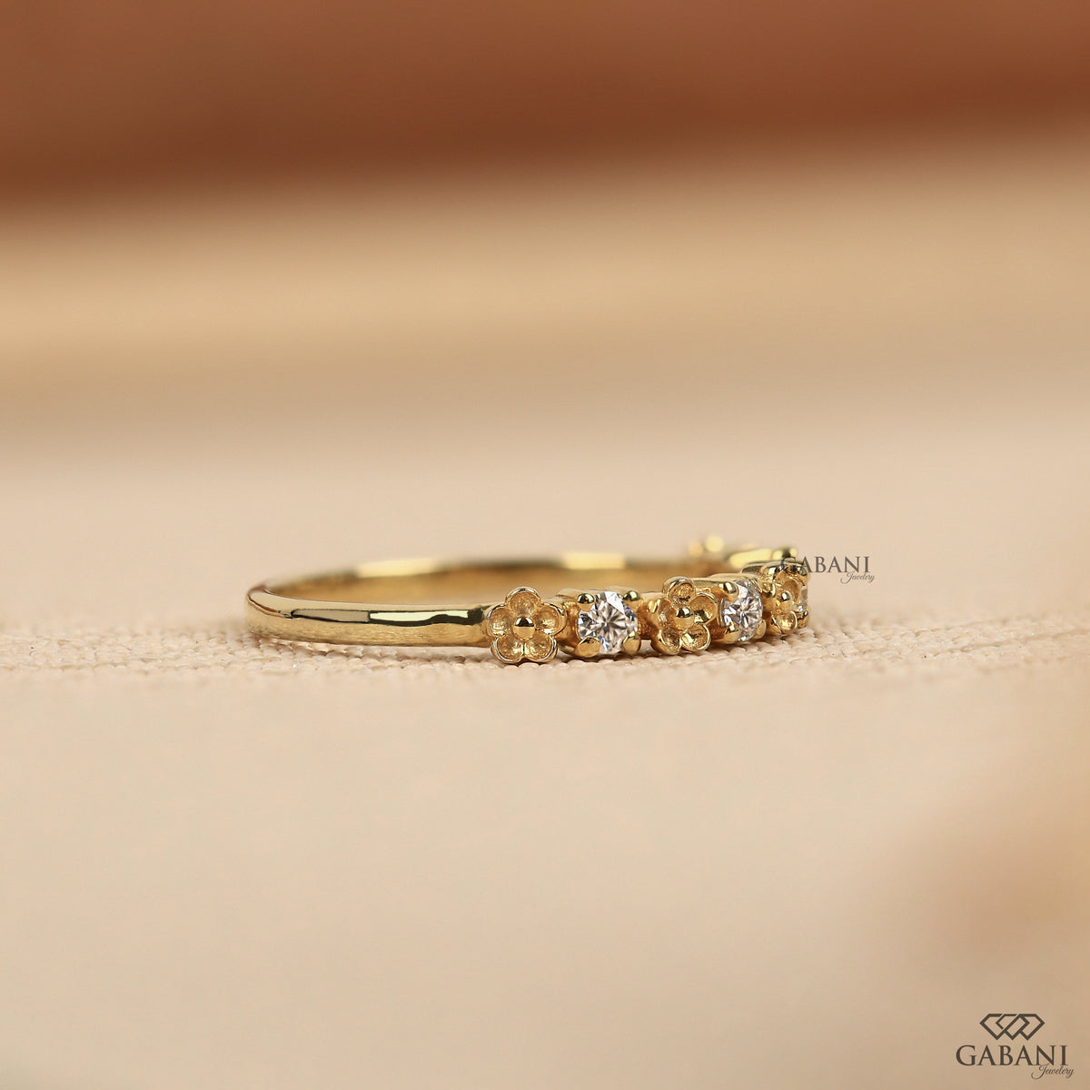 half eternity lab grown diamond band with a floral style and lightweight dainty profile