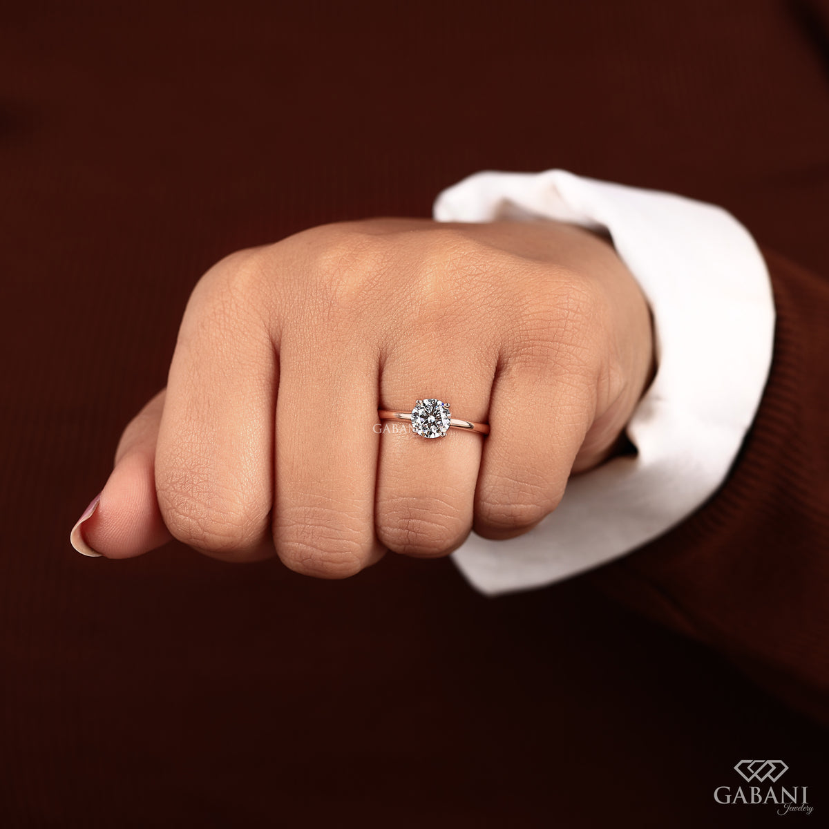 minimal solitaire ring with round lab grown diamond set in rose gold