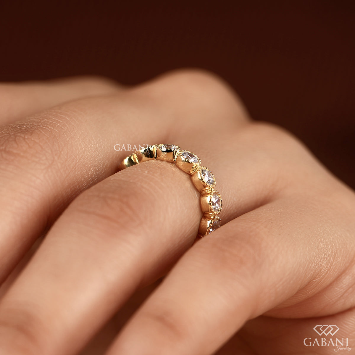 round lab diamond band in 14k gold with thick milgrain edges and eternity style by gabani jewelry