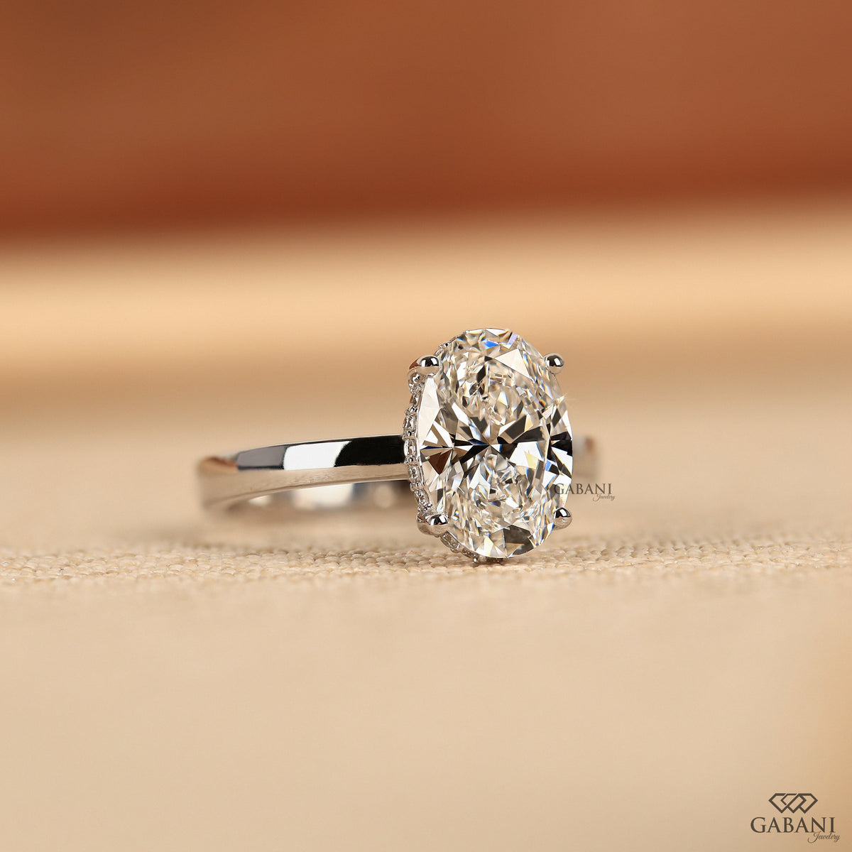 white gold solitaire ring featuring oval cut lab created diamond