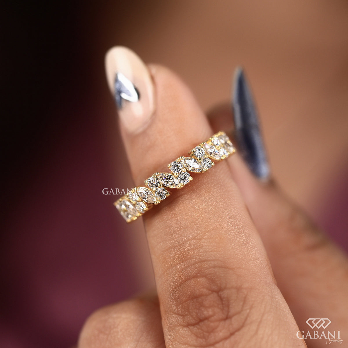 stacking wedding band with marquise and round lab grown diamonds set in smooth yellow gold