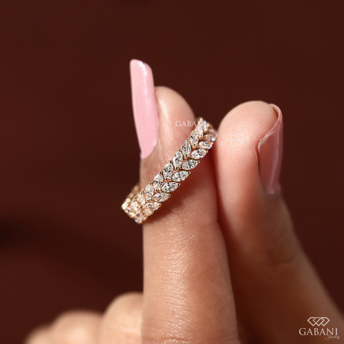 double row marquise lab diamond band in yellow gold by gabani jewelry