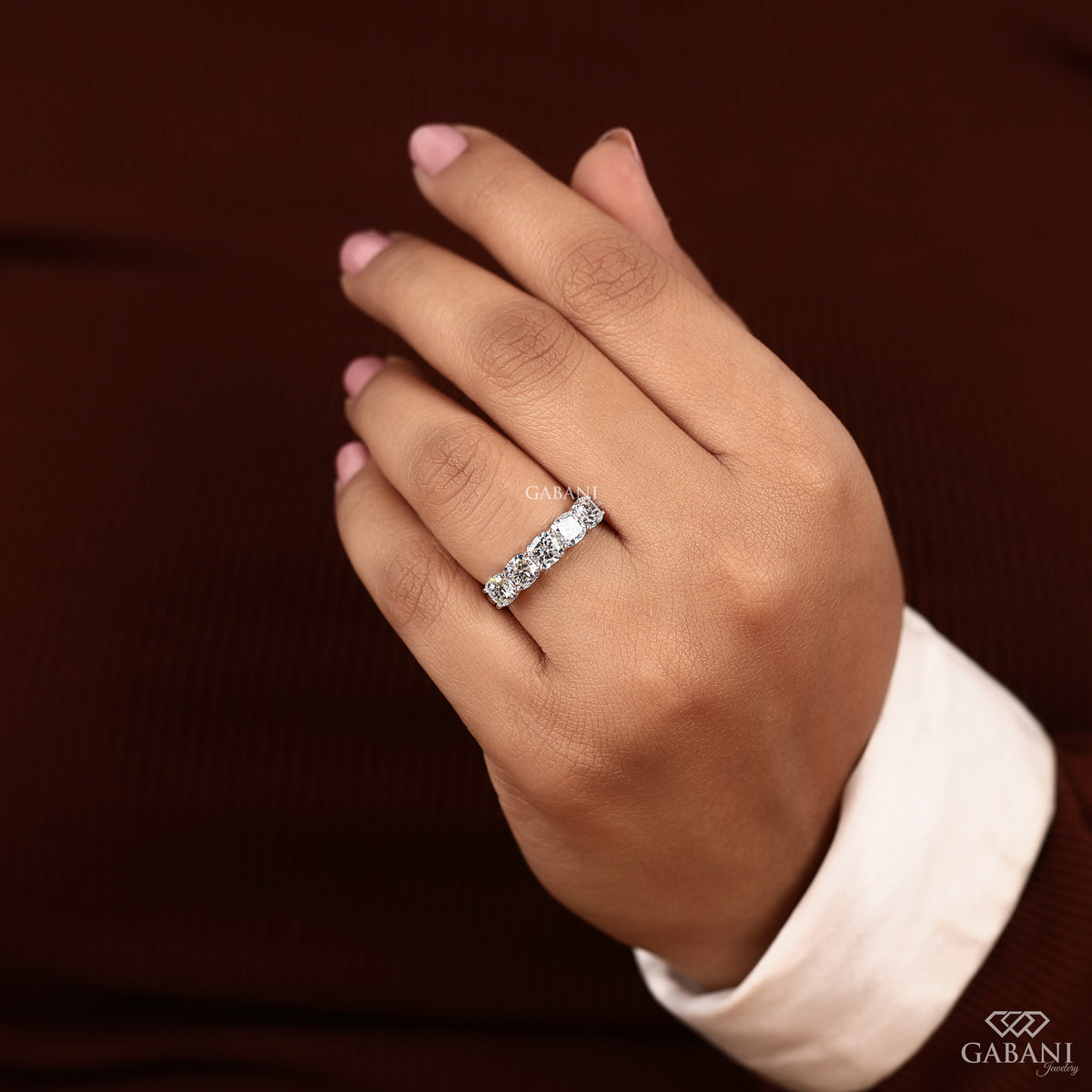 Cushion cut lab grown diamond wedding band in white gold five stone design