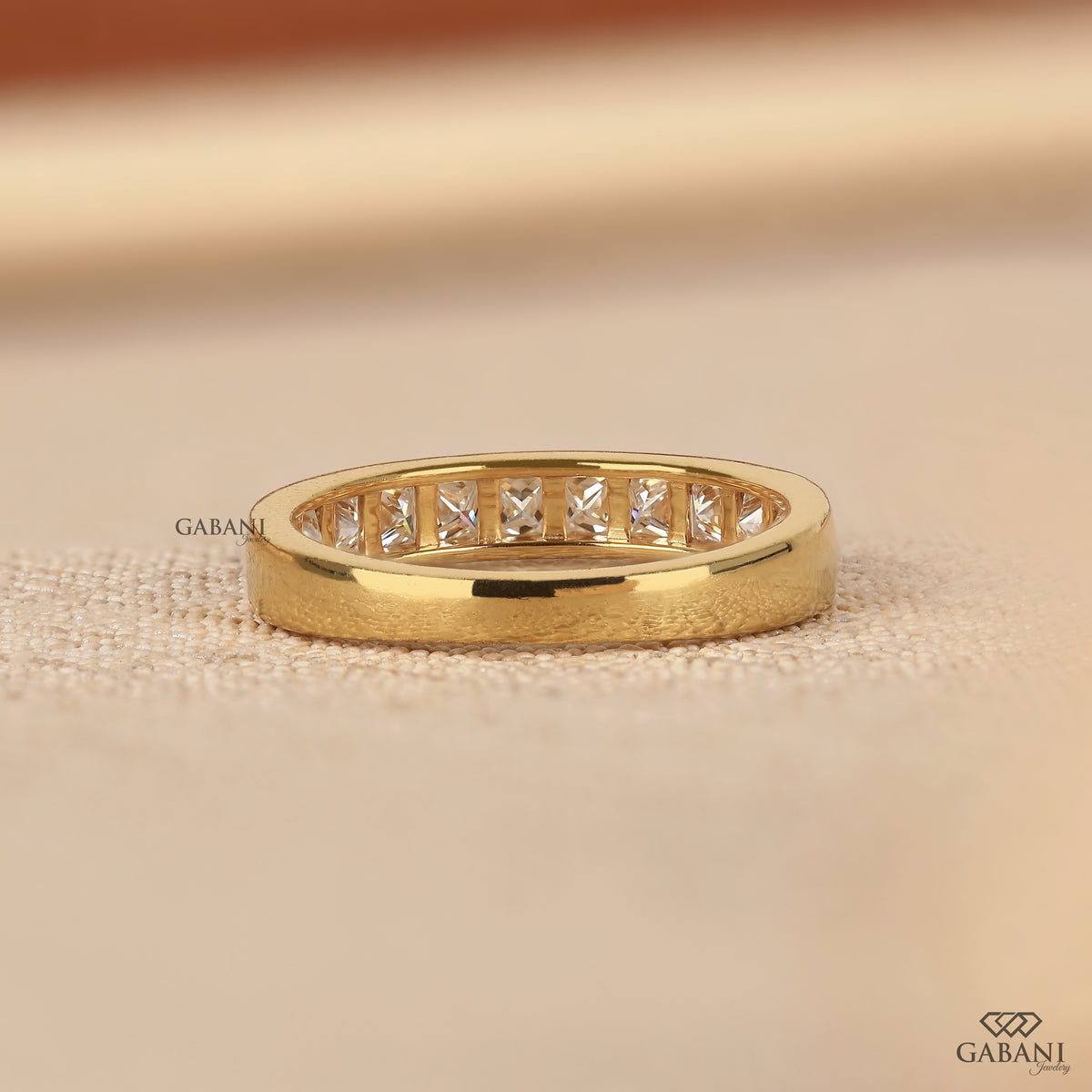 Princess cut lab grown diamond half eternity band with smooth channel setting