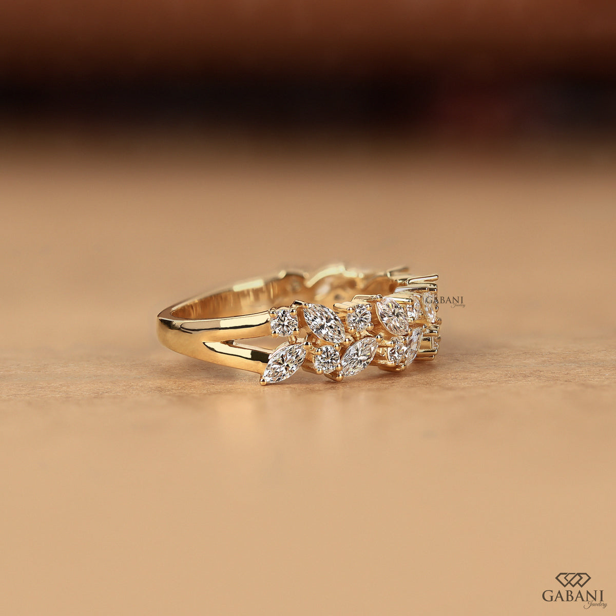 solid gold wedding band with marquise and round cut lab diamonds in half eternity style