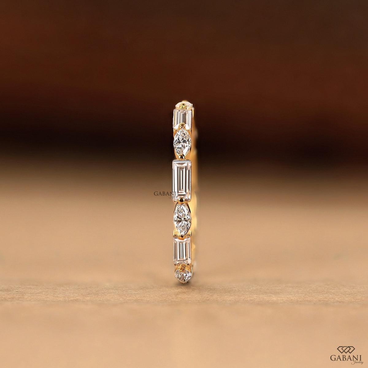 thin marquise baguette diamond eternity band in solid gold