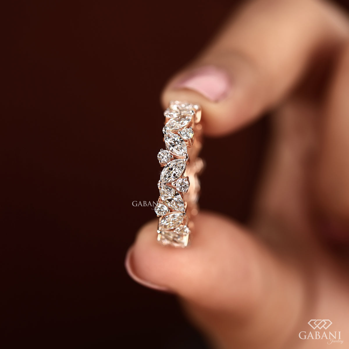 womens rose gold eternity band with marquise and round lab diamonds