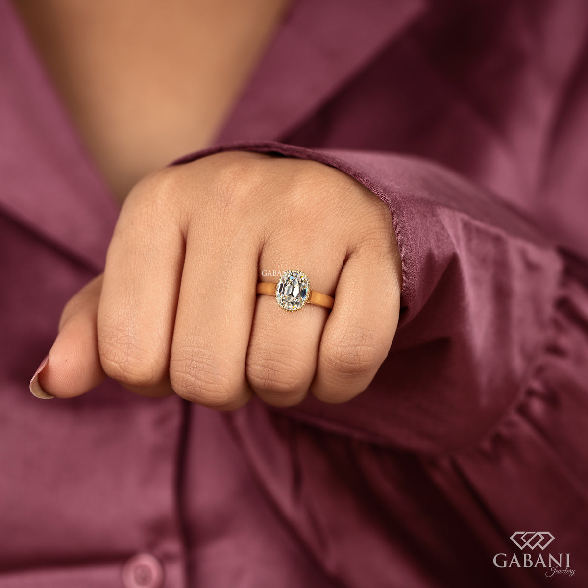 Old mine cushion cut IGI certified lab grown diamond ring with detailed milgrain bezel