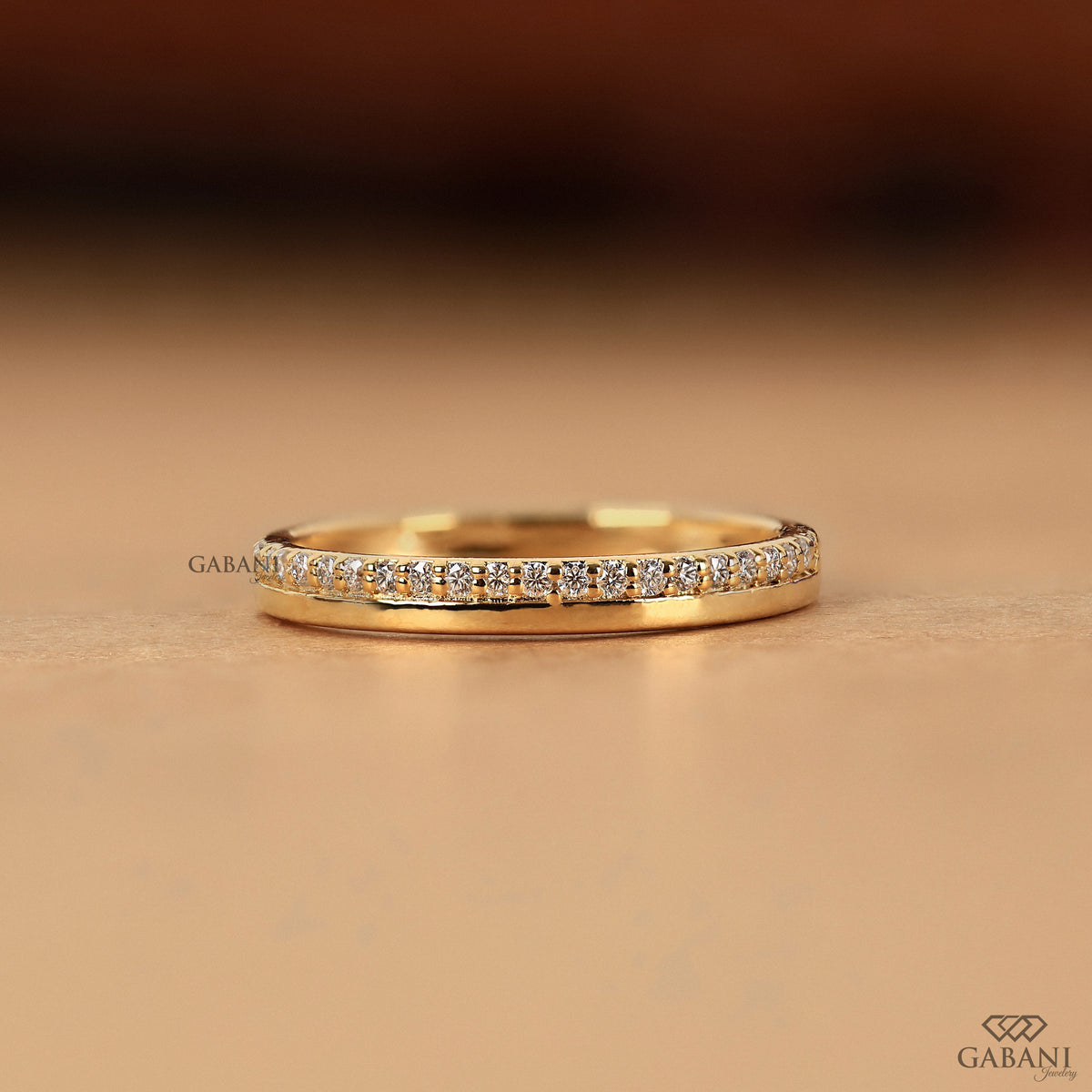 one side pave lab grown diamond band in gold half eternity ring