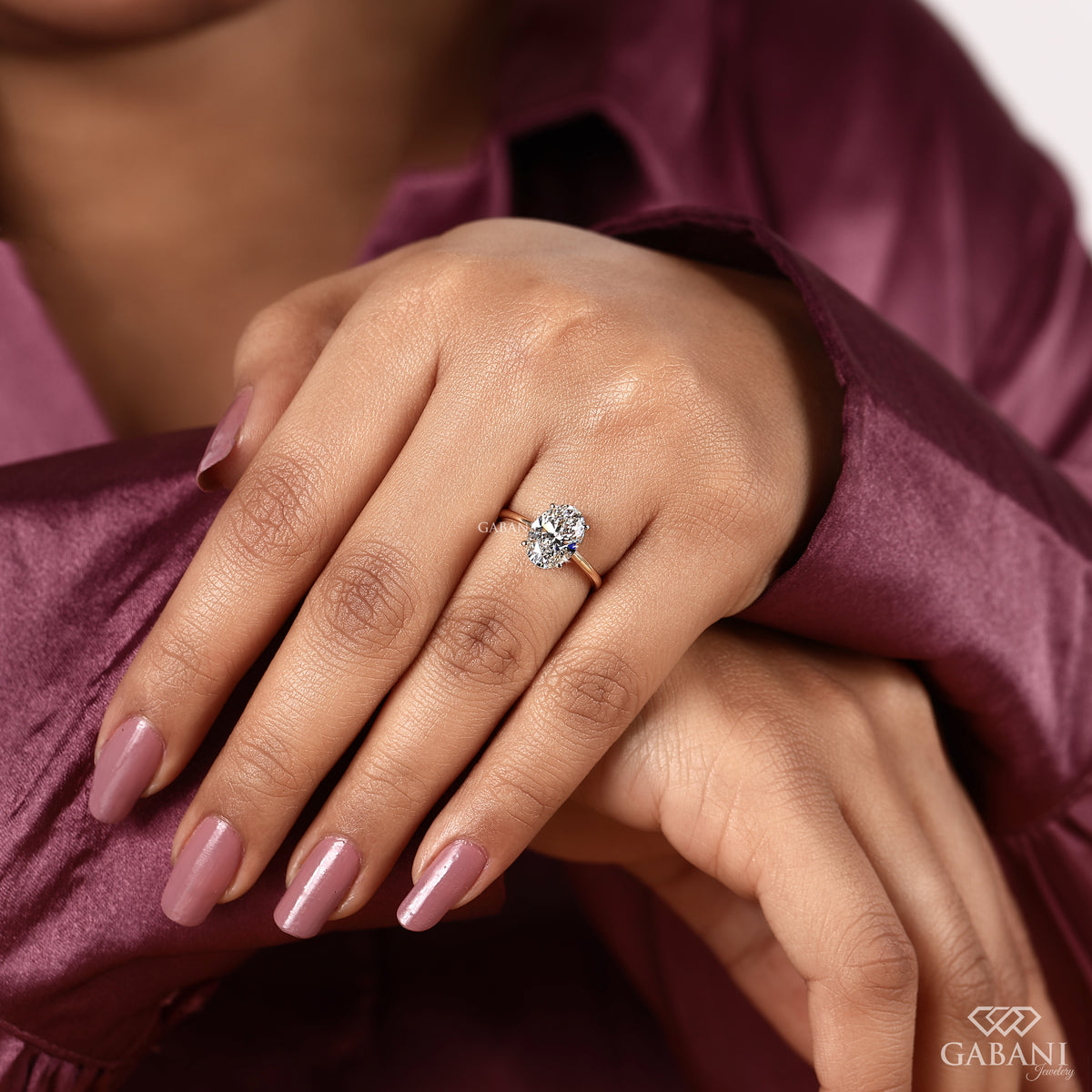 classic oval solitaire lab grown diamond ring in yellow gold with four button prongs