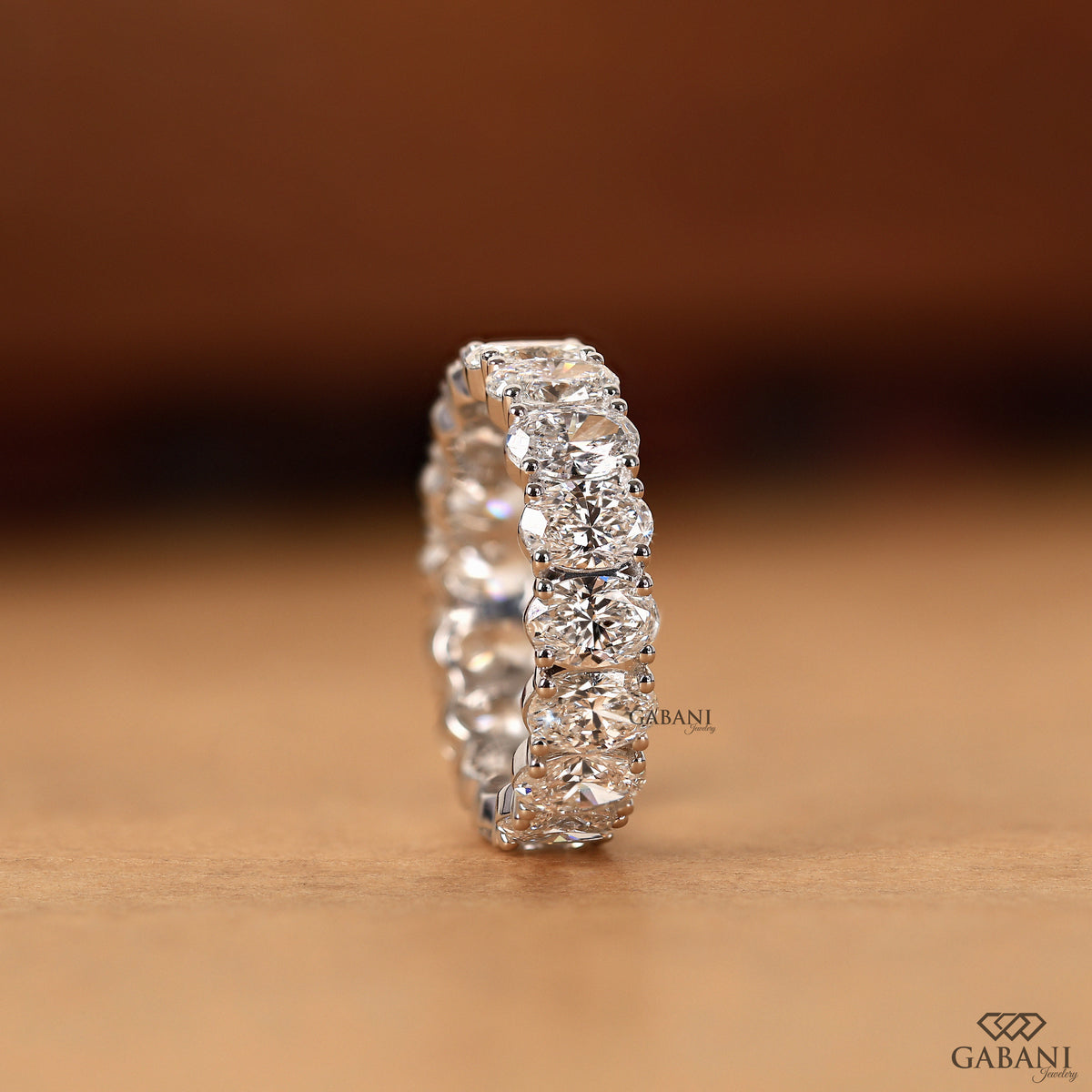 oval cut lab grown diamond eternity wedding band in white gold wide chunky band