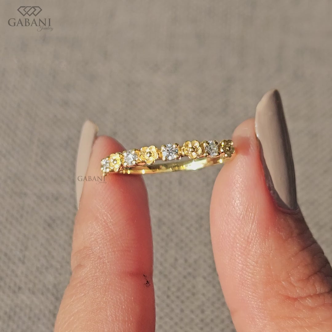dainty lab grown diamond band featuring a floral style design with a minimal half eternity look
