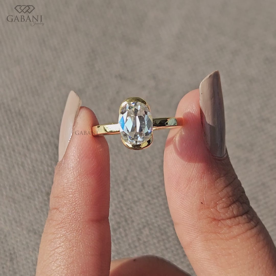 IGI certified lab grown diamond ring featuring old mine oval shape in a refined half bezel setting