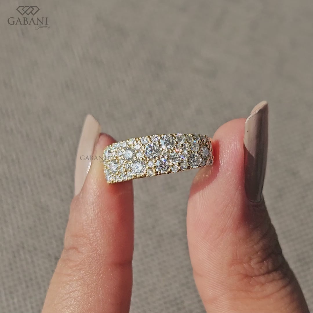 wide yellow gold band with round lab diamond scattered pave setting comfort fit