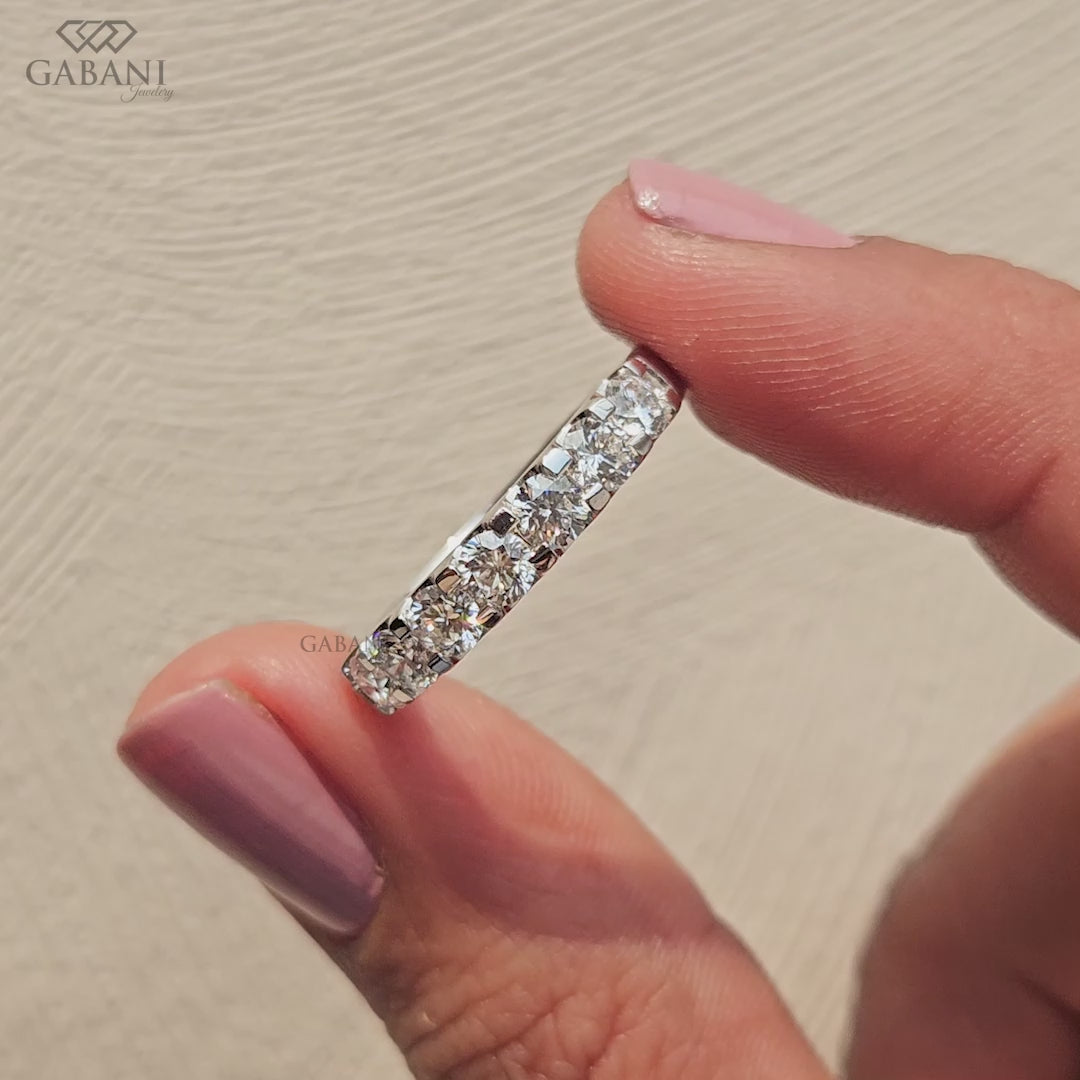 seven stone lab grown diamond wedding band with round diamonds in French pavé white gold ring