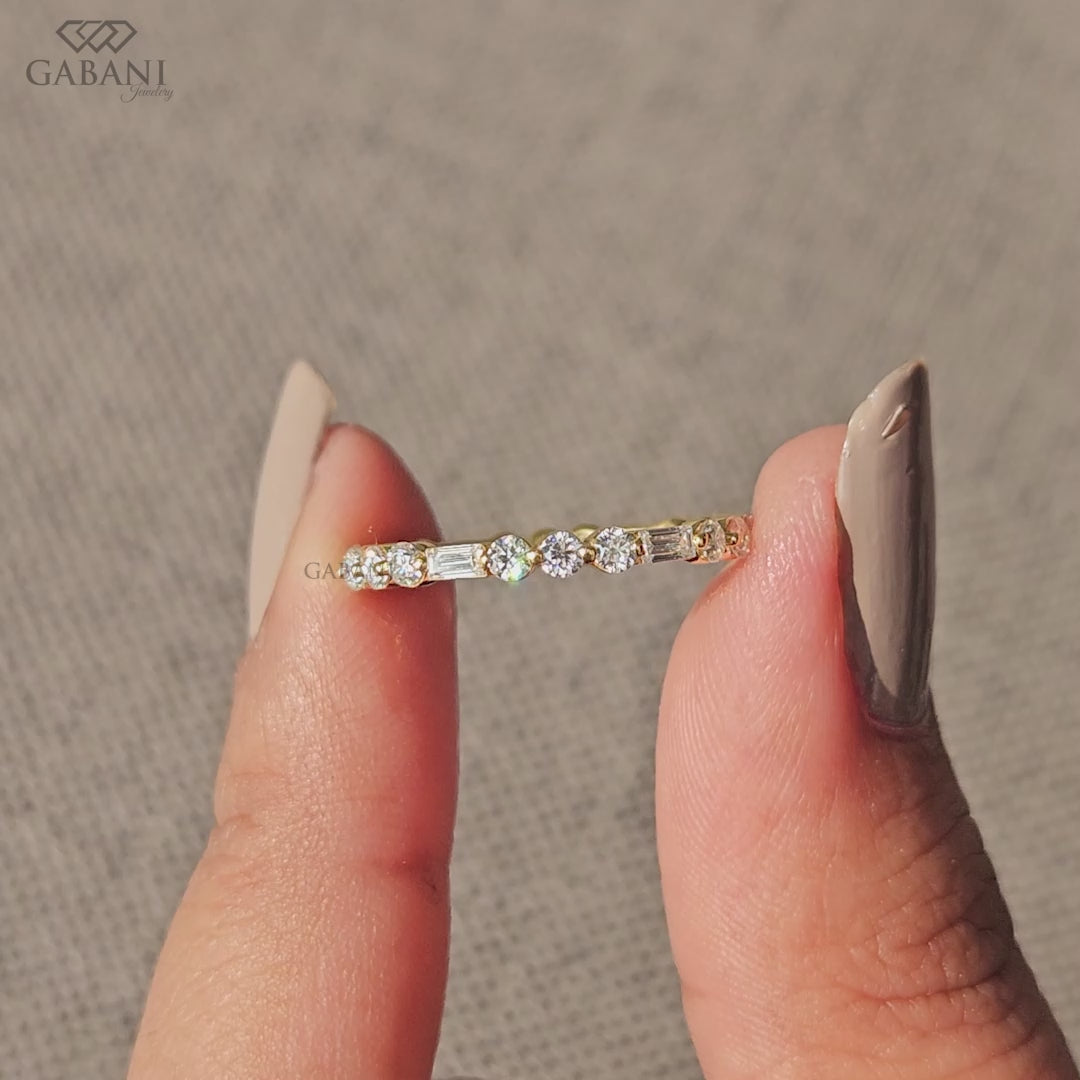 thin 14k yellow gold eternity band with lab grown baguette and round diamonds