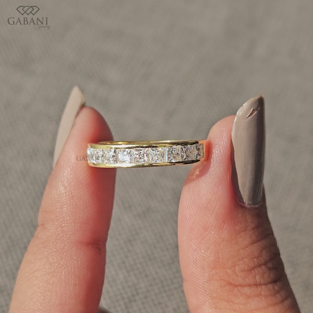 Princess cut lab grown diamond wedding band in smooth 14K yellow gold with channel setting