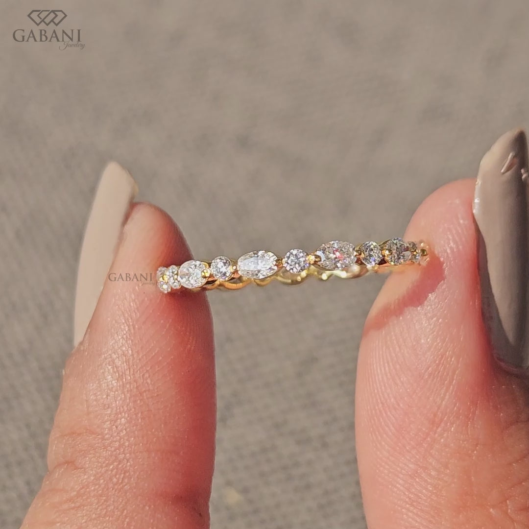 dainty oval round diamond wedding band in solid yellow gold