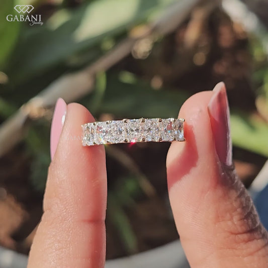 radiant cut lab grown diamond band in gold with half eternity style and evenly spaced diamonds