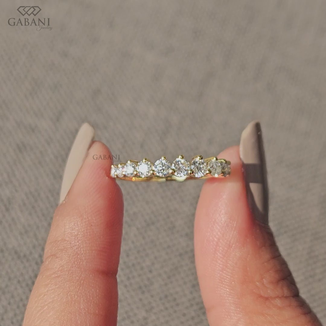 thin yellow gold band with round lab grown diamonds in minimal half eternity style