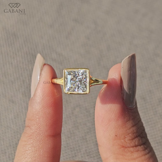 bezel set princess cut lab grown diamond solitaire ring with split shank band