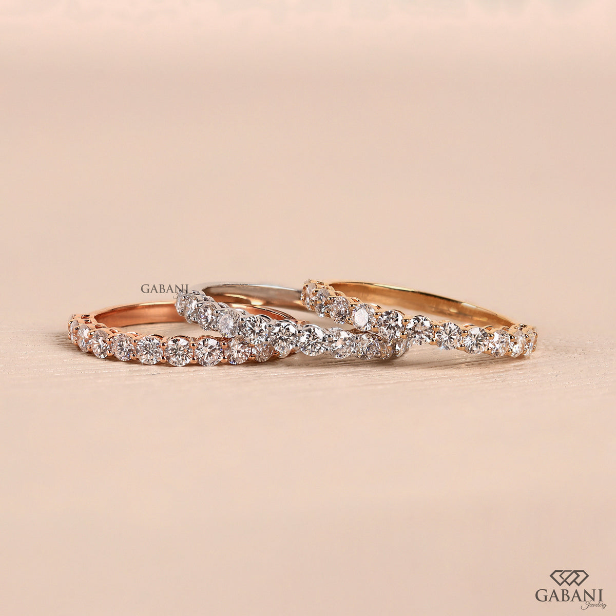 Round lab grown diamond half eternity wedding band in yellow gold with shared prong setting and slim minimal design