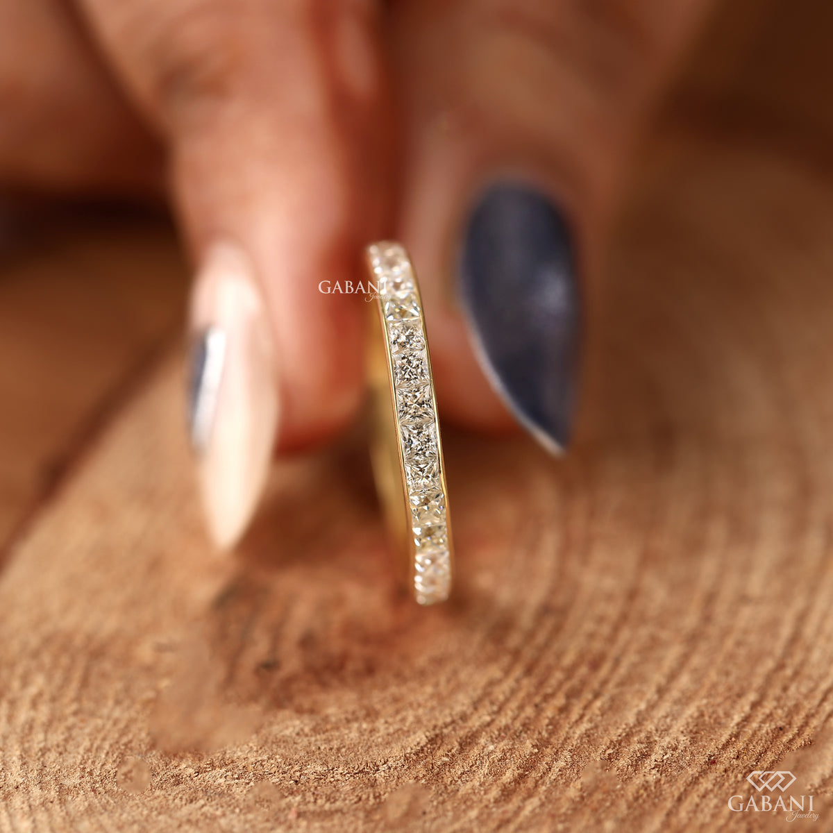 princess cut lab grown diamond channel wedding band with clean modern yellow gold finish