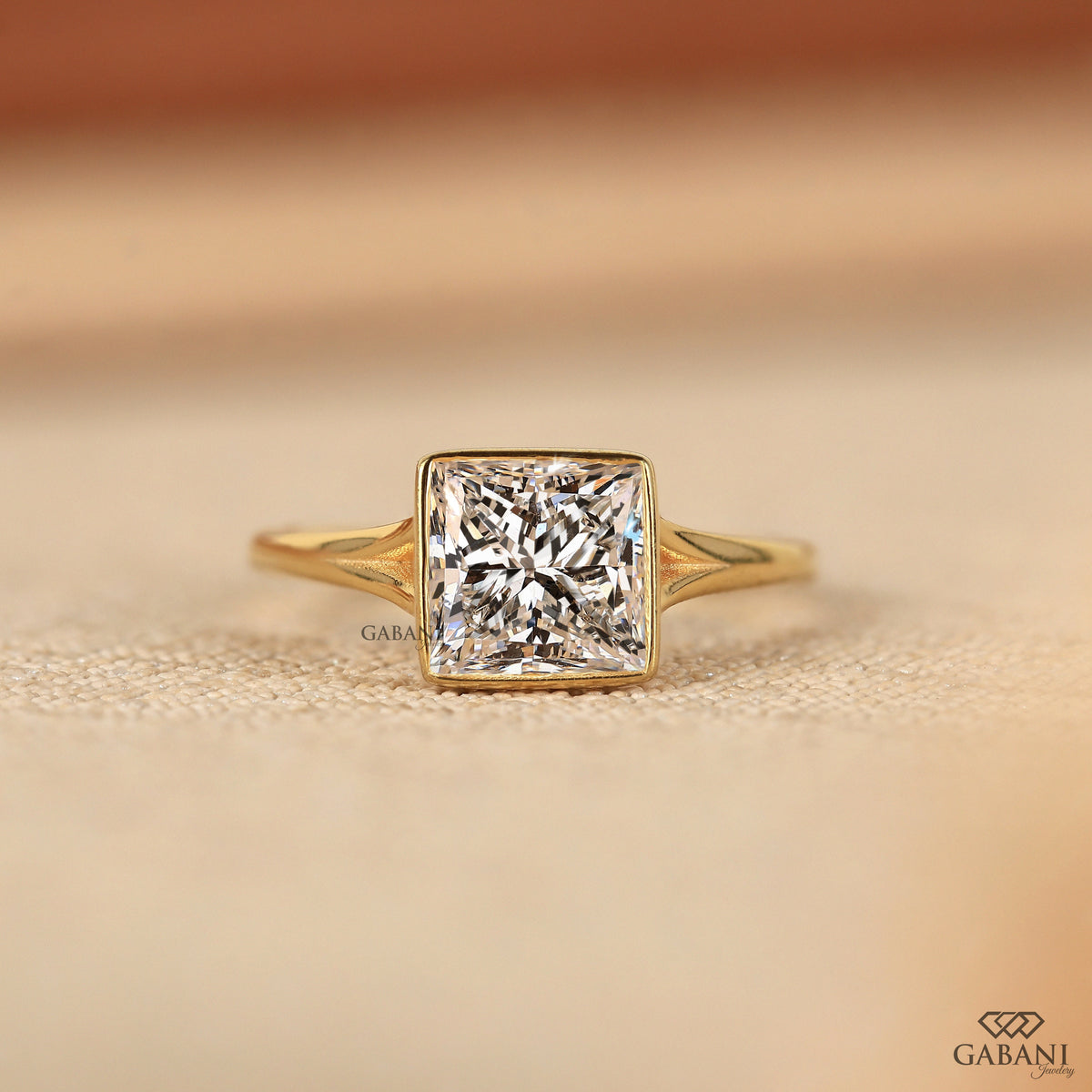 princess cut lab grown diamond ring with slim full bezel and pipe shank design